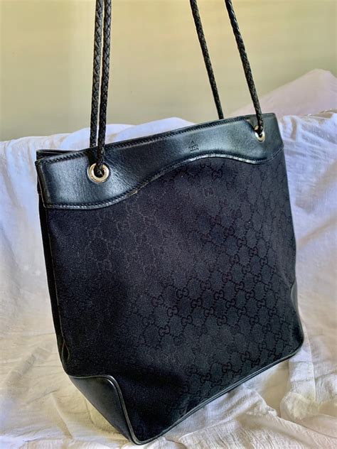 black gucci monogram purse